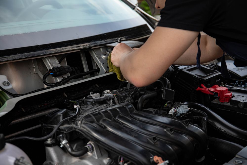 Professional automotive mechanic working in a workshop